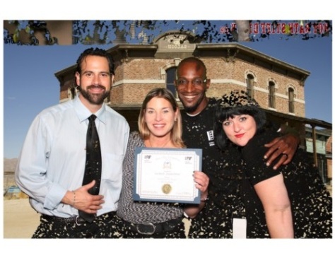 Second from left, Lisa Reznick, holds the Best Short Educational film at the International Family Film Festival at Raleigh Studios in Los Angeles on Nov. 9.  Photo: Courtesy of Lisa Reznick